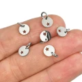 Zawieszka monetka z gwiazdką ok. 10x7mm [zawieszka, stal]