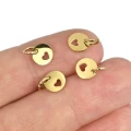 Zawieszka monetka z serduszkiem ok. 10x7mm [zawieszka, stal, kolor złoty PVD]
