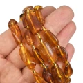 Bursztyn nieregularna bryłka gładka ok. 20x4mm