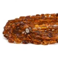 Bursztyn nieregularna bryłka gładka ok. 7-14x3-6mm