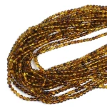 Bursztyn brązowo żółty kula gładka ok. 5mm