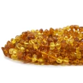Bursztyn sieczka układany złoto miodowy ok. 6-10x3,5-5mm