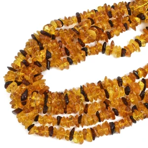 Bursztyn  pomarańczowo żółto brązowy sieczka ok. 8-15x3-4,5mm