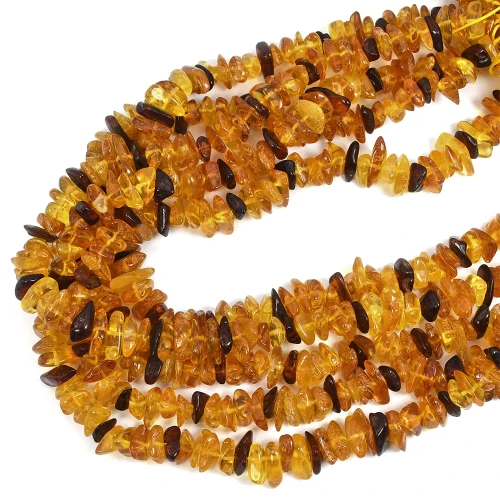 Bursztyn  pomarańczowo żółto brązowy sieczka ok. 8-15x3-4,5mm